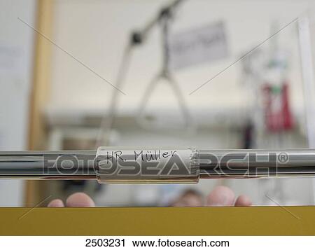 Stock Image - Patient's name label on hospital bed . Fotosearch