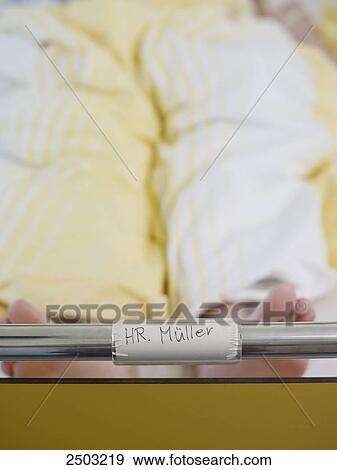 Stock Photo - Patient's name label on hospital bed . Fotosearch