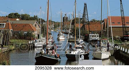 People on boats at harbor, Netherlands View Large Photo Image Stock Photo - People on boats at harbor, Netherlands . Fotosearch