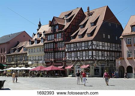 Stock Image - People walking on street . Fotosearch