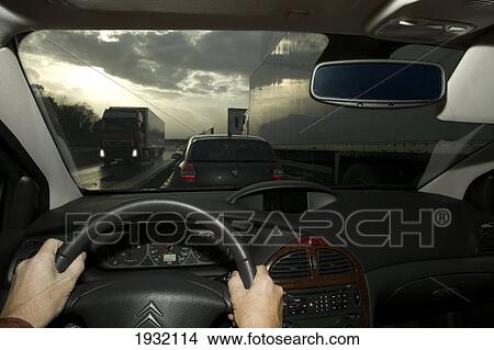 Person driving car View Large Photo Image Picture - Person driving car . Fotosearch