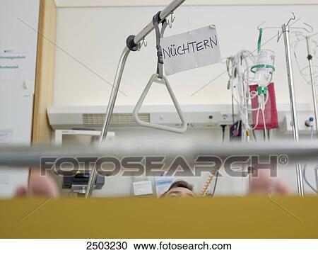 Placard hanging on patient's bed in hospital View Large Photo Image Stock Image - Placard hanging on patient's bed in hospital . Fotosearch