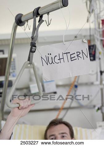 Placard hanging on patient's bed in hospital View Large Photo Image Stock Photo - Placard hanging on patient's bed in hospital . Fotosearch