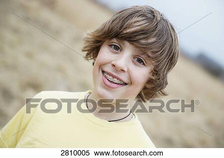 Portrait of boy smiling View Large Photo Image Stock Photography - Portrait of boy smiling . Fotosearch