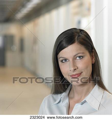 Picture - Portrait of businesswoman smiling . Fotosearch