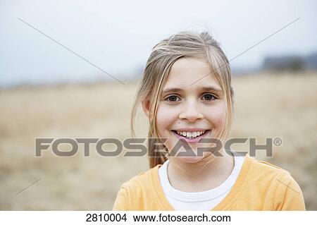 Picture - Portrait of girl smiling . Fotosearch