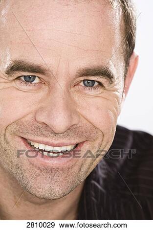 Portrait of man smiling View Large Photo Image Stock Photo - Portrait of man smiling . Fotosearch