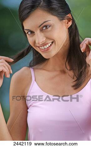 Stock Photo - Portrait of woman smiling . Fotosearch