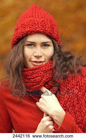 Stock Photograph - Portrait of woman wearing warm clothing . Fotosearch