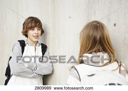 Stock Photo - Primary school students talking . Fotosearch