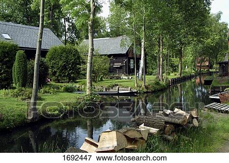 Stock Photo - Reflection of trees in river . Fotosearch