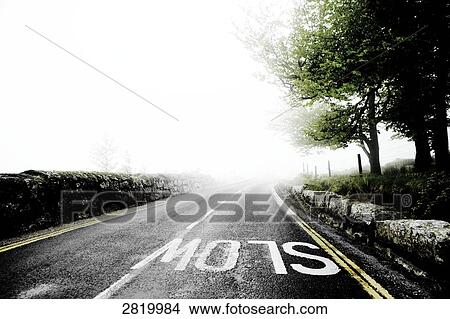 Road in fog, Dartmoor, Devon, England View Large Photo Image Picture - Road in fog, Dartmoor, Devon, England . Fotosearch