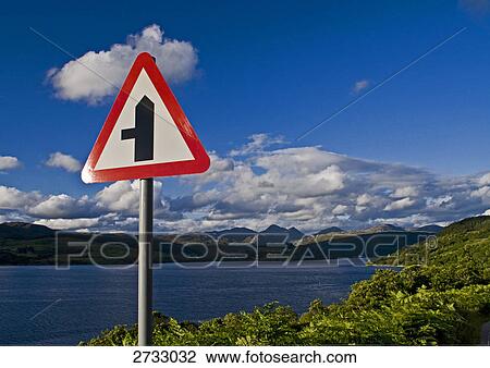 Stock Image - Road sign at lakeside . Fotosearch