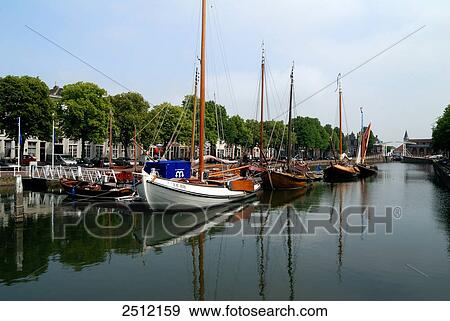 Stock Photo - Sailboats at harbor . Fotosearch