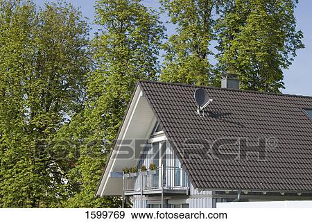 Satellite dish on roof View Large Photo Image Stock Photo - Satellite dish on roof . Fotosearch