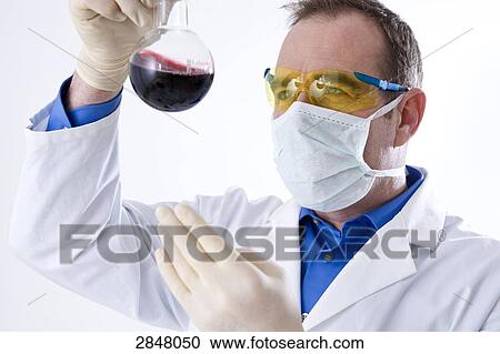 Scientist examining in lab View Large Photo Image Stock Image - Scientist examining in lab . Fotosearch