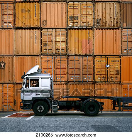 Semi-truck and cargo containers at port, Hamburg, Germany View Large Photo Image Stock Photography - Semi-truck and cargo containers at port, Hamburg, Germany . Fotosearch