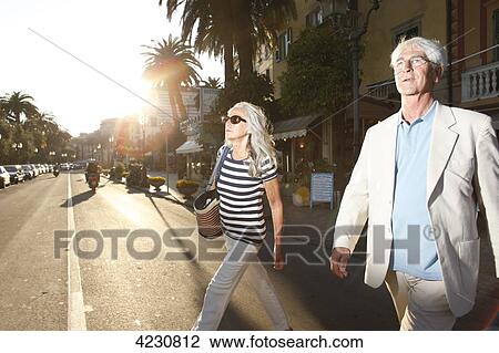 Senior couple crossing road, Italy, Rapallo View Large Photo Image Stock Image - Senior couple crossing road, Italy, Rapallo . Fotosearch