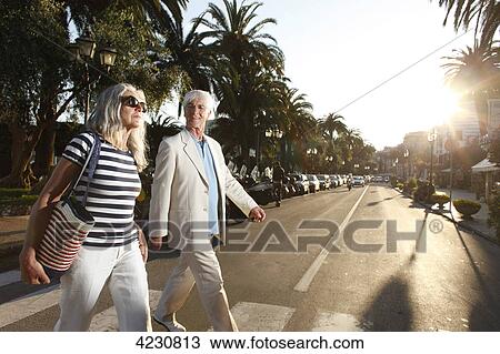 Senior couple crossing road, Italy, Rapallo View Large Photo Image Stock Image - Senior couple crossing road, Italy, Rapallo . Fotosearch