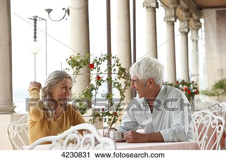 Senior couple in a restaurant, Italy, Gardone Riviera View Large Photo Image Stock Image - Senior couple in a restaurant, Italy, Gardone Riviera . Fotosearch