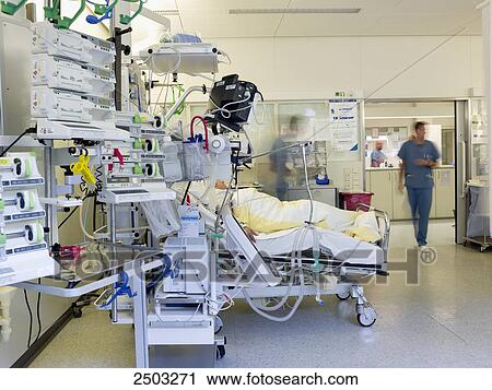 Side profile of patient lying on bed in hospital View Large Photo Image Stock Image - Side profile of patient lying on bed in hospital . Fotosearch