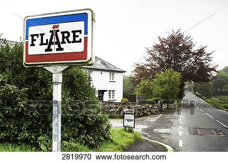 Stock Image - Signboard of inn at roadside, Flare Inn, Dartmoor, Devon, England . Fotosearch