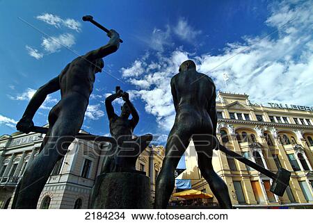 Statue of men at town square View Large Photo Image Picture - Statue of men at town square . Fotosearch