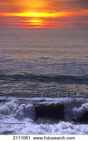 Stock Image - Sunset over sea . Fotosearch