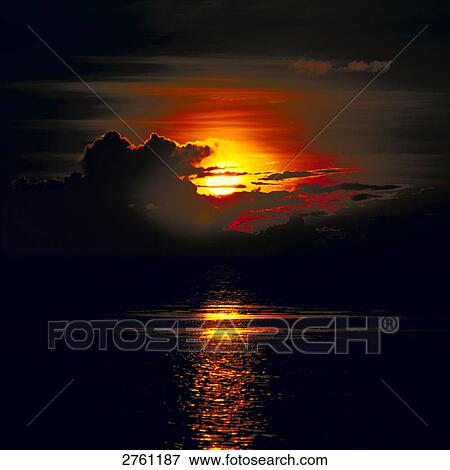 Stock Photo - Sunset over sea . Fotosearch
