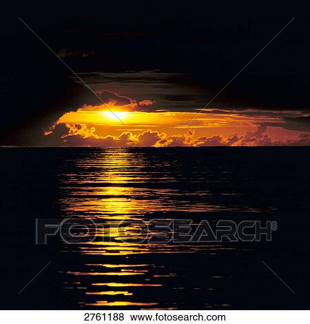Stock Photo - Sunset over sea . Fotosearch