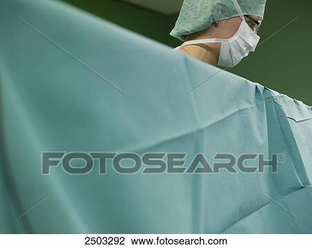 Surgeon in operating room View Large Photo Image Stock Image - Surgeon in operating room . Fotosearch