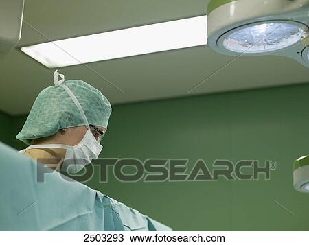 Surgeon in operating room View Large Photo Image Stock Image - Surgeon in operating room . Fotosearch
