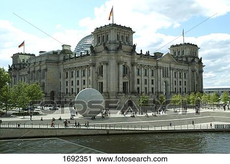 Tourists in front of government building, Reichstag, Berlin, Germany View Large Photo Image Stock Image - Tourists in front of government building, Reichstag, Berlin, Germany . Fotosearch