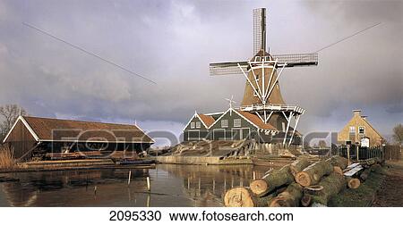 Traditional windmill and saw mill at coast, Netherlands View Large Photo Image Stock Image - Traditional windmill and saw mill at coast, Netherlands . Fotosearch