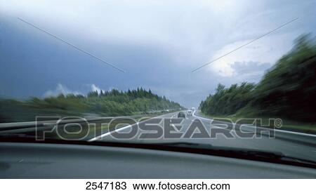 Traffic on highway in rain View Large Photo Image Stock Image - Traffic on highway in rain . Fotosearch