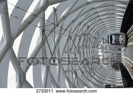 Stock Image - Train arriving at platform . Fotosearch