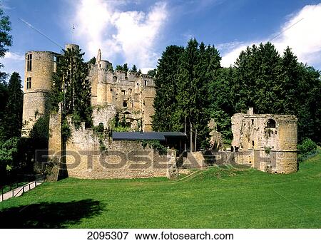 Trees in front of castle View Large Photo Image Stock Photo - Trees in front of castle . Fotosearch
