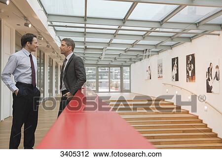 Two business men having a break View Large Photo Image Stock Image - Two business men having a break . Fotosearch