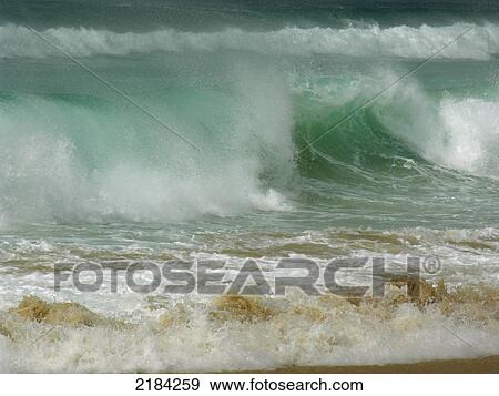 Waves on beach View Large Photo Image Stock Photo - Waves on beach . Fotosearch