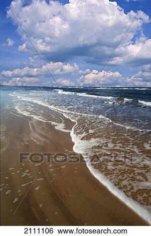 Waves on beach View Large Photo Image Stock Photograph - Waves on beach . Fotosearch