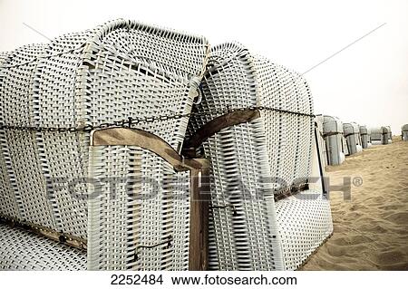 Picture - Wicker beach chairs on beach . Fotosearch