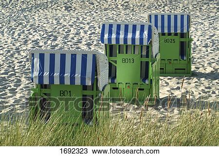 Wicker beach chairs on beach View Large Photo Image Stock Image - Wicker beach chairs on beach . Fotosearch