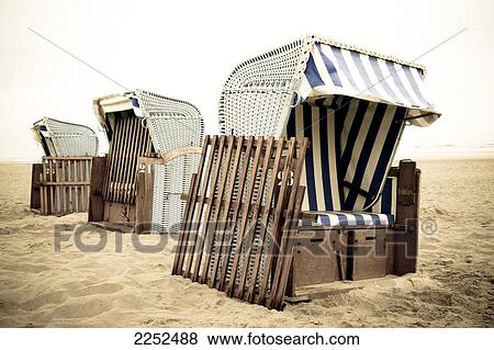 Wicker beach chairs on beach View Large Photo Image Stock Photo - Wicker beach chairs on beach . Fotosearch