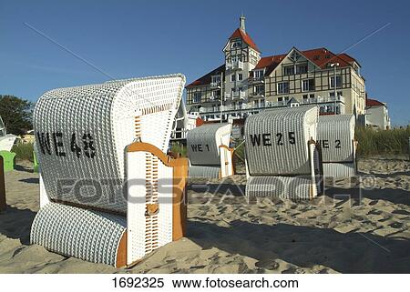 Wicker beach chairs on beach View Large Photo Image Stock Photography - Wicker beach chairs on beach . Fotosearch