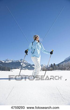 Woman cross-country skiing, Tannheimer Tal, Tyrol, Austria View Large Photo Image Stock Image - Woman cross-country skiing, Tannheimer Tal, Tyrol, Austria . Fotosearch