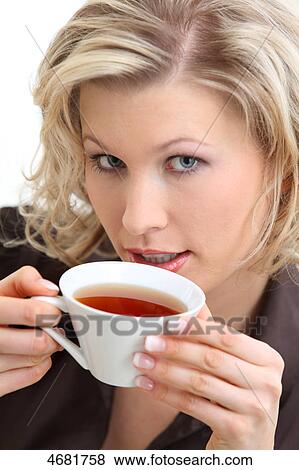 Stock Photo - Woman drinking tea . Fotosearch