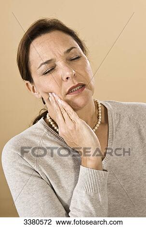 Stock Image - Woman having toothache . Fotosearch
