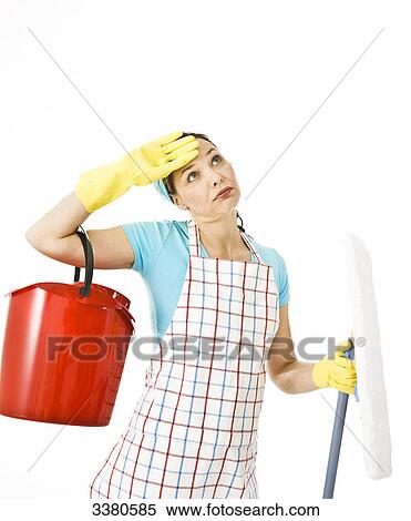 Woman holding cleaning bucket and mop View Large Photo Image Stock Photography - Woman holding cleaning bucket and mop . Fotosearch