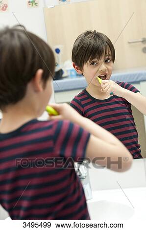 Young boy brushing his teeth View Large Photo Image Stock Photo - Young boy brushing his teeth . Fotosearch