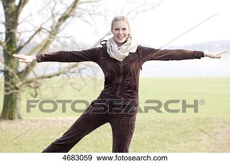 Young woman doing workout View Large Photo Image Stock Photo - Young woman doing workout . Fotosearch